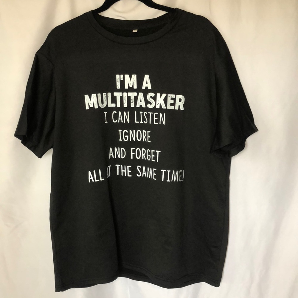 Black short sleeve tee shirt “I’m a multi tasker”statement on front. Size XL.
